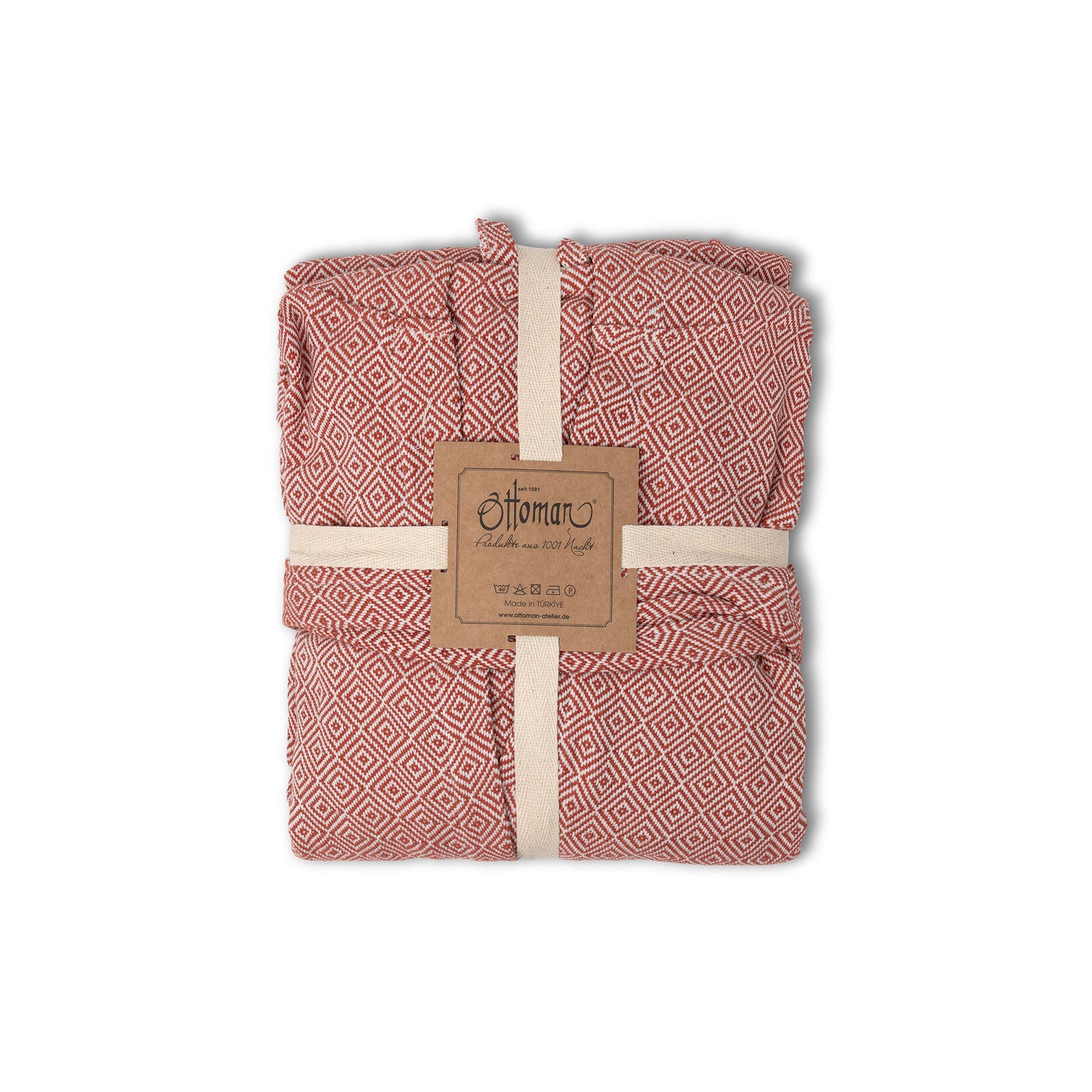 Bademantel Raute aus 100 % Baumwolle in Terracotta, zusammengefaltet mit Banderole